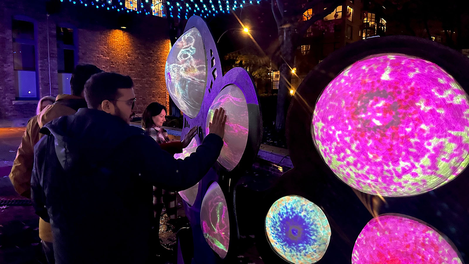 interactive light art featuring globes